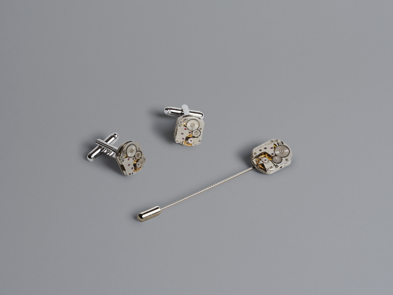 Epingle à cravate et paire de boutons de manchette mécanismes